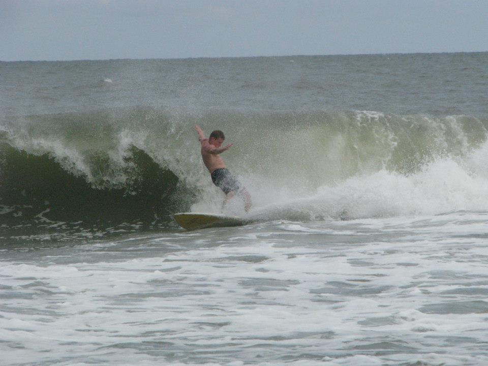 man surfing wave
